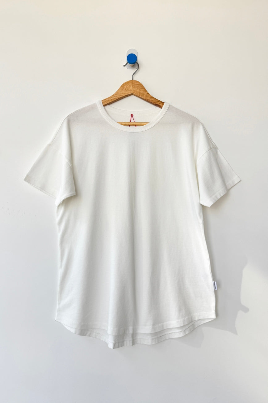 Her Tee